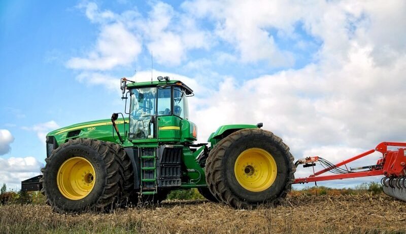 Be it a small or a big farmer with tons of everyday yield, a tractor is that one vehicle every farm needs. Tractors are the backbone of modern farming, revolutionising agricultural practices worldwide. Their importance lies in their ability to efficiently perform various tasks, from ploughing fields and planting crops to harvesting and hauling loads. Tractors increase productivity, reduce labour requirements, and enable farmers to work on larger land areas more precisely.