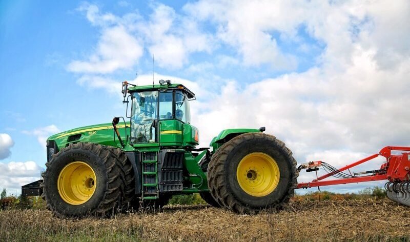 Be it a small or a big farmer with tons of everyday yield, a tractor is that one vehicle every farm needs. Tractors are the backbone of modern farming, revolutionising agricultural practices worldwide. Their importance lies in their ability to efficiently perform various tasks, from ploughing fields and planting crops to harvesting and hauling loads. Tractors increase productivity, reduce labour requirements, and enable farmers to work on larger land areas more precisely.